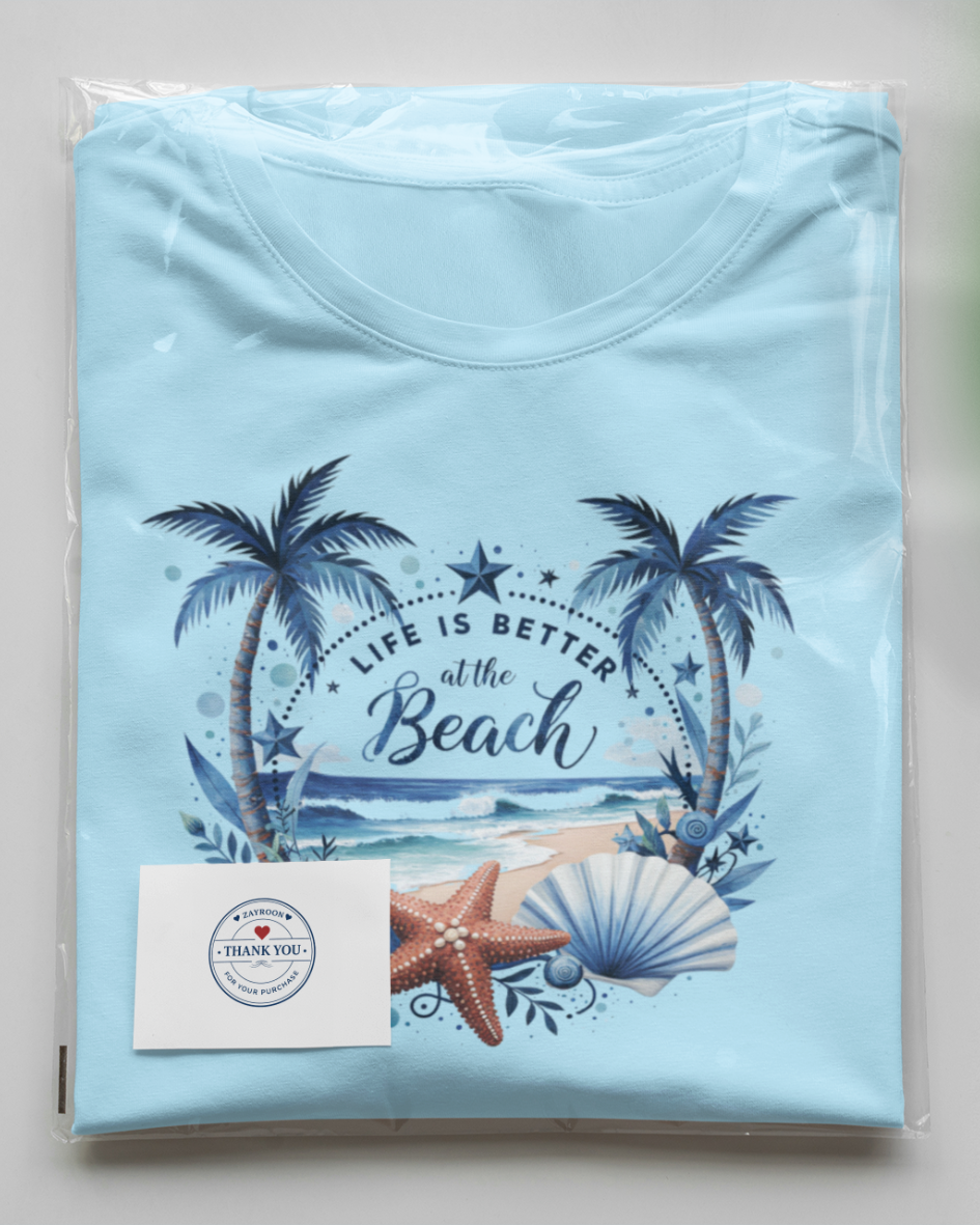life is better at the beach graphic t-shirt, premium cotton blue tee with tropical beach design, summer casual wear